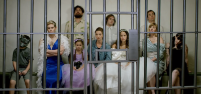 Zoe and Zilla in jail after a trying episode of wedding dress shopping